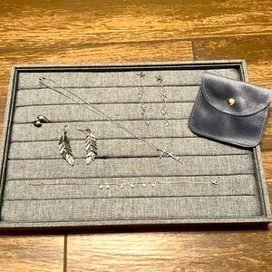 Silver jewelry combo with earrings, ring necklace, and anklet.